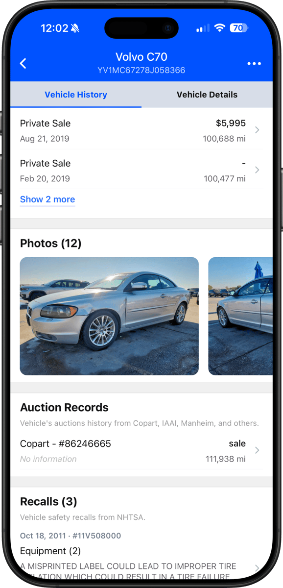 Screen displaying recent vehicle sales and market data